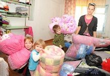 Приехавшие в Свободный беженцы из Украины пока очень нуждаются в тёплых вещах и продуктах