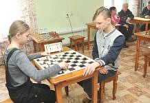 Свободный и Белогорск сыграли в шашки в честь 23 февраля