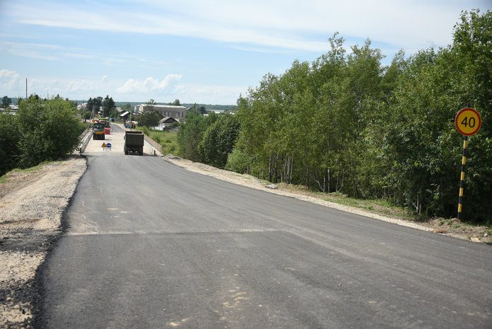 На дороге в селе Сычёвка Свободненского района начали укладывать асфальт